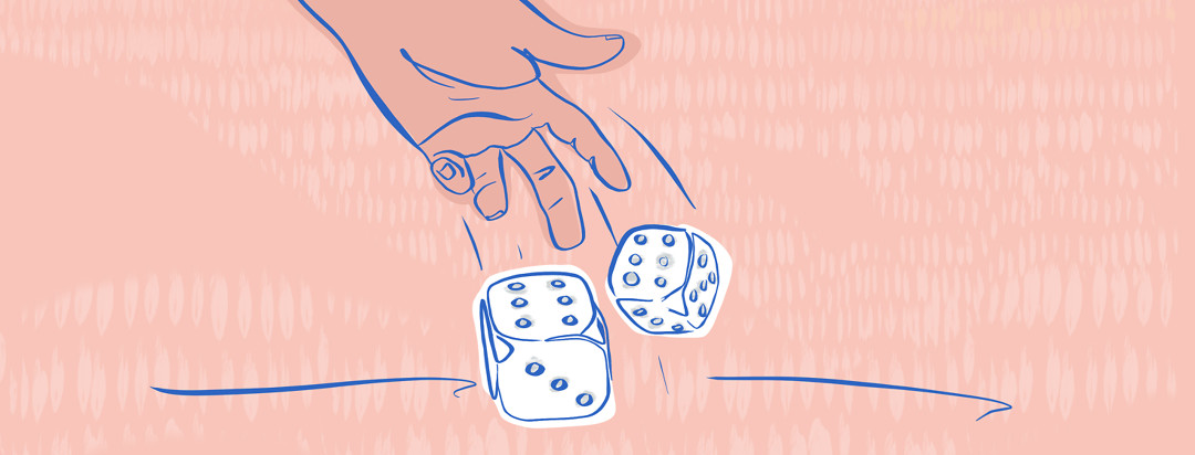 A hand of a person with axial spondyloarthritis rolling a pair of dice.