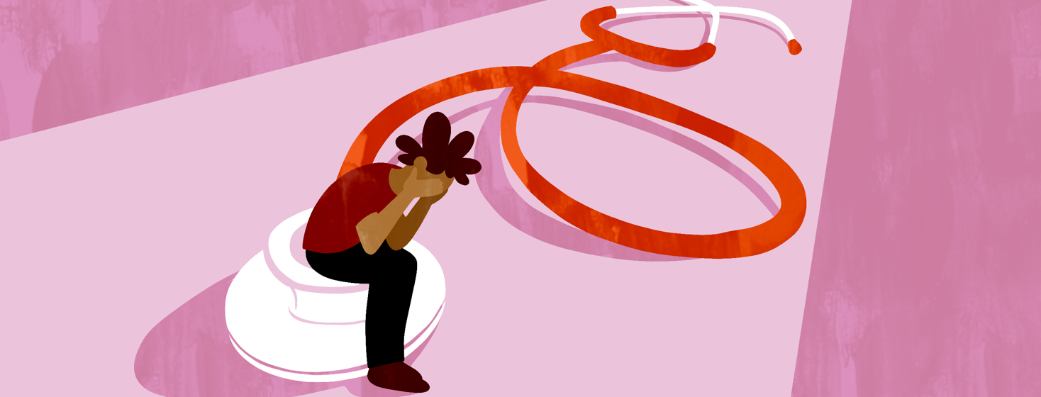 A defeated person sits on a large stethoscope with their head in their hands.