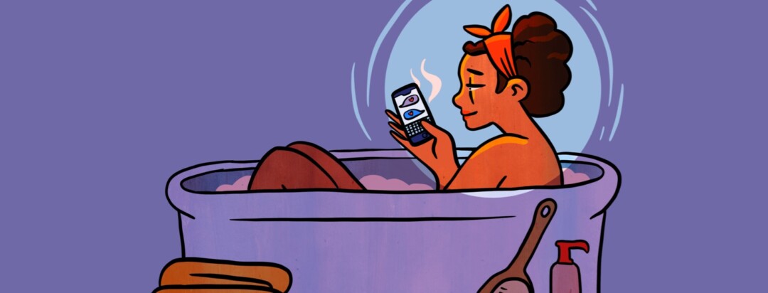 A woman relaxing in a bath tub as she texts people