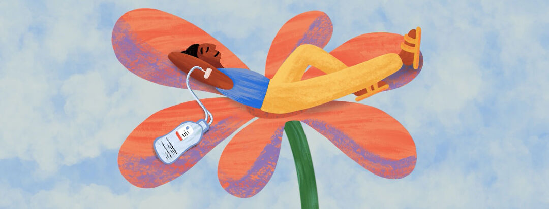 Person comfortably laying on a flower with an IV infusion treatment connected to their arm